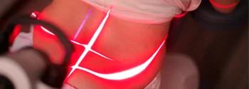 Patient receiving FX 405 cold laser therapy on the neck to reduce pain and inflammation