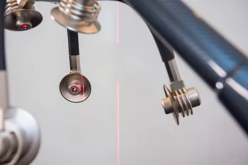 Close-up of Zerona Z6 cold laser device targeting fat cells during a non-invasive body contouring treatment