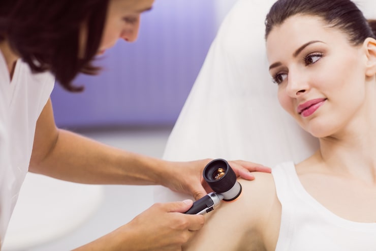 Healthcare provider examining a patient during a comprehensive Lyme disease evaluation and consultation.