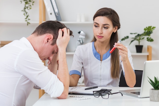 Healthcare provider performing a personalized hormone evaluation and wellness consultation.