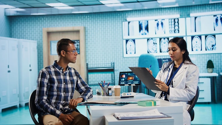 Healthcare provider reviewing a personalized wellness plan with a patient during an Elevate O2 Membership consultation.