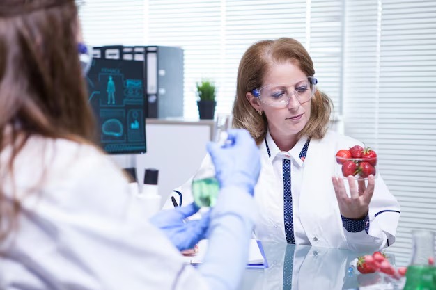 Functional medicine doctor discussing personalized metabolic health results with a patient