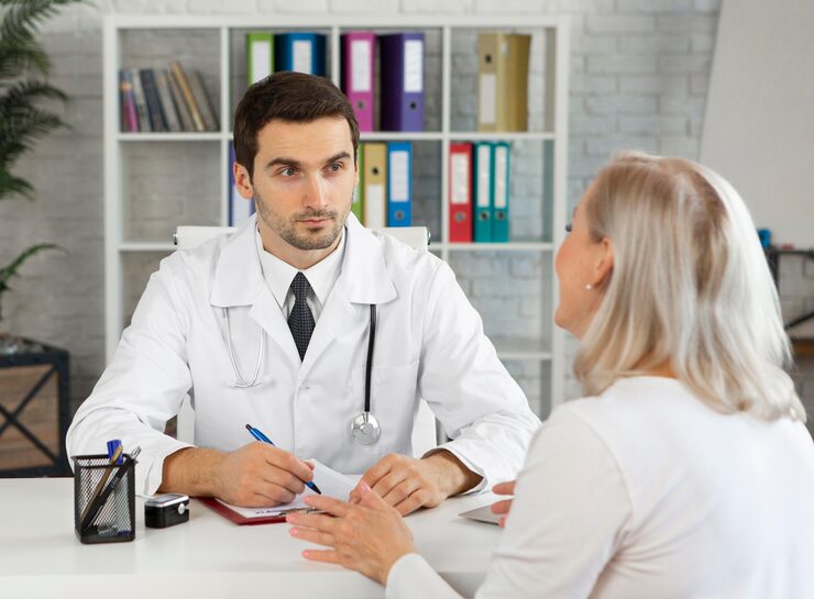 Functional medicine doctor consulting with a patient during a personalized health appointment