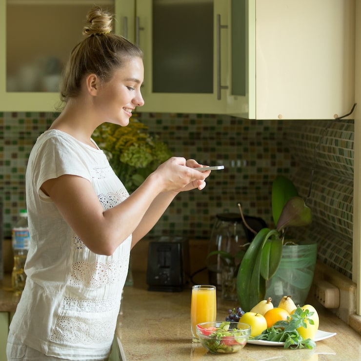 Patient preparing a healthy meal as part of a personalized Terrain Health and nutrition program.
