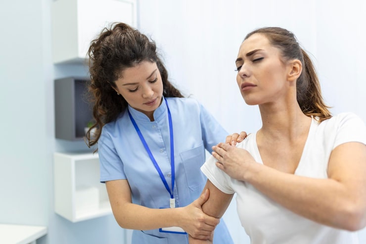 Healthcare provider helping a patient manage chronic pain through personalized treatment.