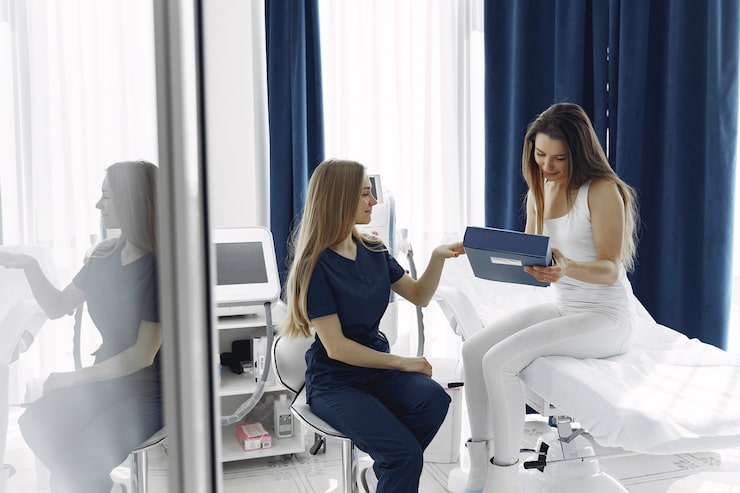 Functional medicine provider evaluating factors that affect the body's internal environment and overall health.