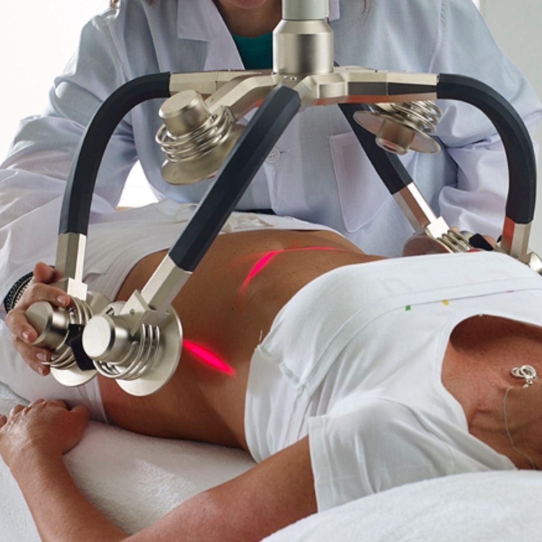 Zerona Z6 laser therapy applied to the abdomen for non-invasive fat reduction and body sculpting